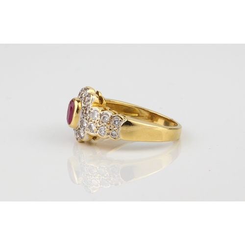 193 - An 18ct yellow gold, ruby and diamond cluster ring - stamped '750', the central 5 x 3.5mm oval cut r... 