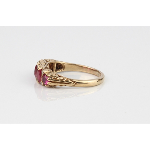 185 - An 18ct yellow gold, ruby and diamond Victorian style ring - not marked, tests as 18ct gold, the fiv... 