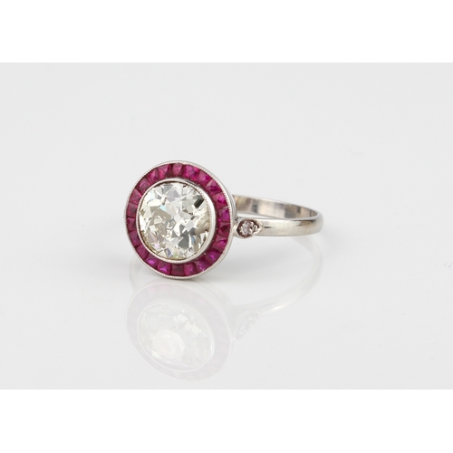 177 - A fine Art Deco platinum, ruby and diamond target ring - the 1.72ct old brilliant cut diamond within... 