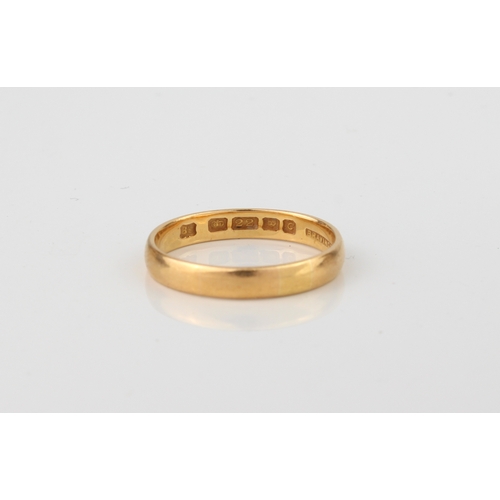 194 - A 22ct yellow gold wedding band - hallmarked London 1958, size N½.