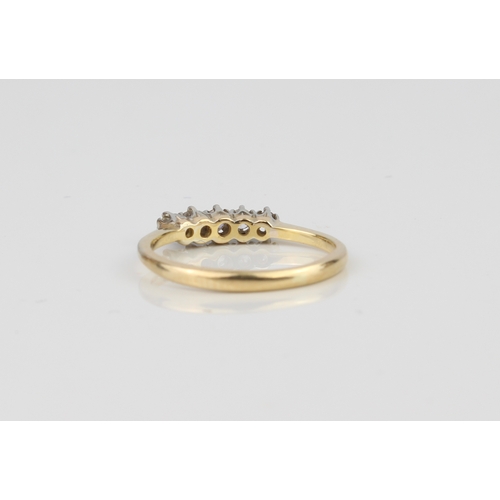 206 - An 18ct yellow gold and diamond five stone ring - marked '18CT', with five claw set brilliant and si... 