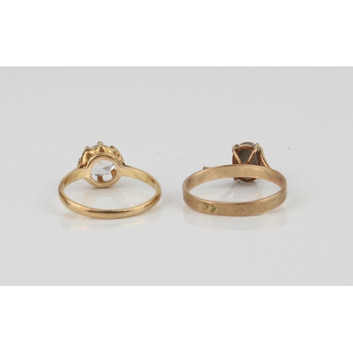 231 - Two 9ct gold stone set rings - comprising an opal triplet ring with twist setting, marked '9CT', siz... 