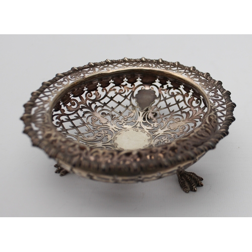 108 - An Edwardian pierced and engraved silver shallow dish - James Dixon & Sons, Sheffield 1903, with fla... 