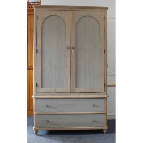 407 - A 19th century style painted pine linen press - the shallow moulded top over a pair of arched panell... 