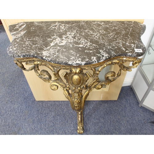 436 - An antique carved giltwood and marble console table - the later grey and white marble top on a folia... 