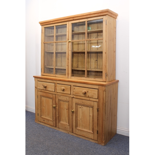 464 - A Victorian and later waxed pine glazed dresser - the moulded cornice over a pair of four-pane glaze... 