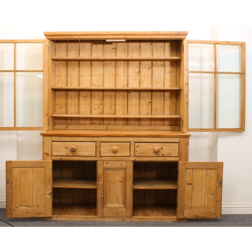 464 - A Victorian and later waxed pine glazed dresser - the moulded cornice over a pair of four-pane glaze... 