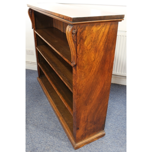 482 - A mid-19th century burr walnut open bookcase - the well figured top on boldly carved foliate bracket... 