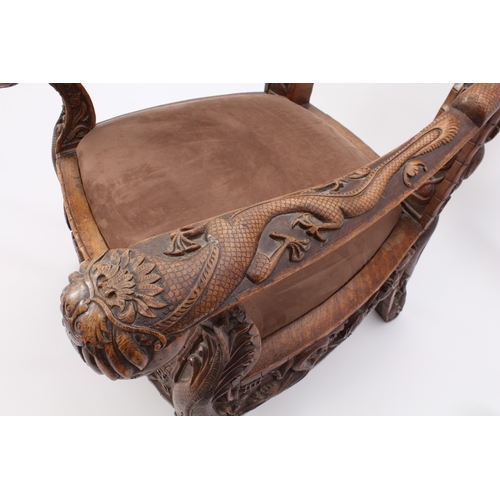 58 - A pair of Anglo-Chinese carved hardwood spoon back armchairs - c.1900