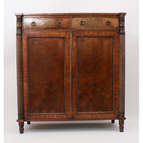 474 - A Regency mahogany chiffonier - the rectangular top with outset front angles, on foliate carved and ... 