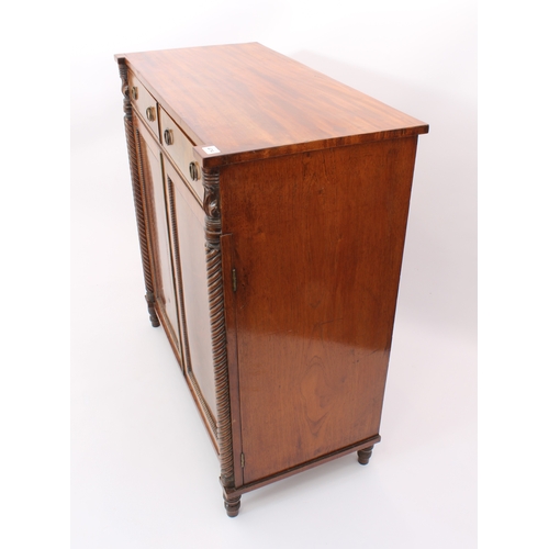 474 - A Regency mahogany chiffonier - the rectangular top with outset front angles, on foliate carved and ... 