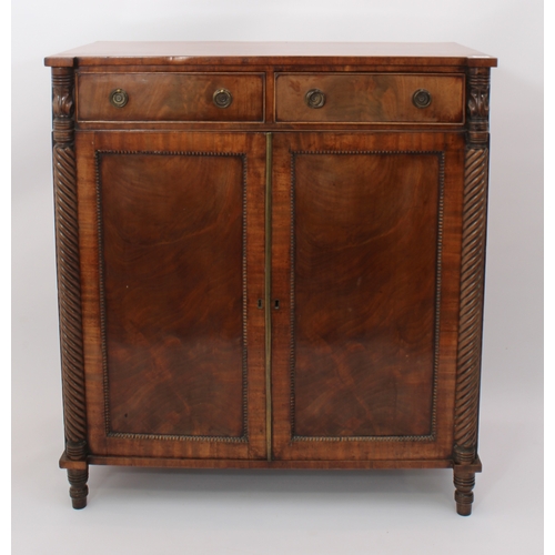 474 - A Regency mahogany chiffonier - the rectangular top with outset front angles, on foliate carved and ... 