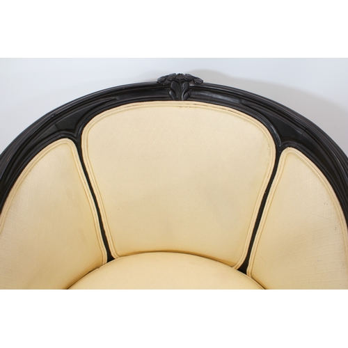 514 - A pair of ebonised bergeres in the Louis XVI style - modern, with pale gold upholstery, 61.5 cm wide... 