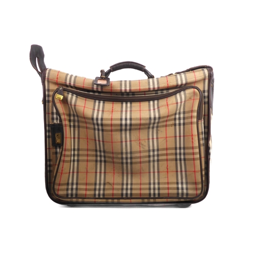 577 - A vintage Burberry suit carrier case - 1980s, in classic check with dark brown leather trim and gold... 