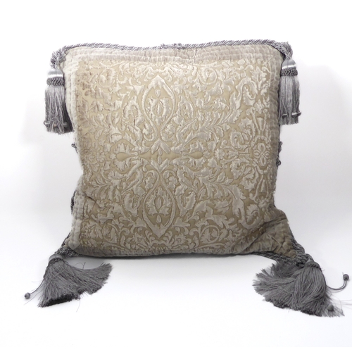 579 - A large Dorma cushion in a quilted velvet design, silver double rope piping and silver tassels at ea... 