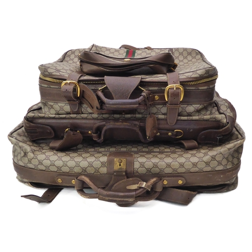 570 - A suite of vintage Gucci Guccissima leather and web monogram canvas luggage - 1980s, comprising a la... 