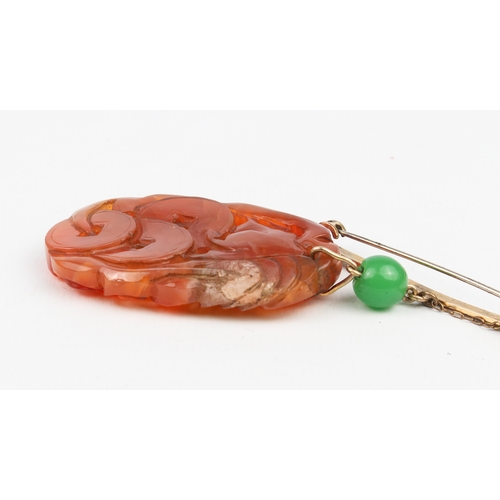 230 - A mid-century Chinese carved jade plaque on bar brooch - the ovoid, russet jade plaque pierced and c... 