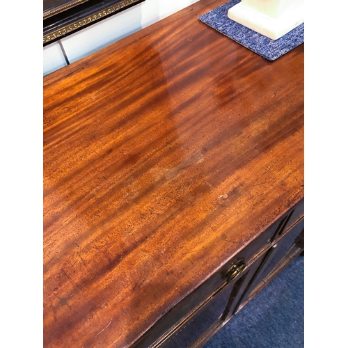 474 - A Regency mahogany chiffonier - the rectangular top with outset front angles, on foliate carved and ... 