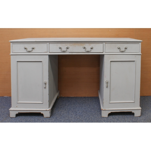 378 - A grey-painted double pedestal desk: first half 20th century, the moulded top over three frieze draw... 