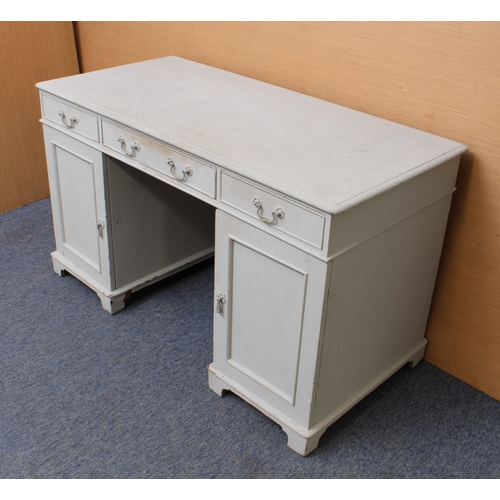 378 - A grey-painted double pedestal desk: first half 20th century, the moulded top over three frieze draw... 