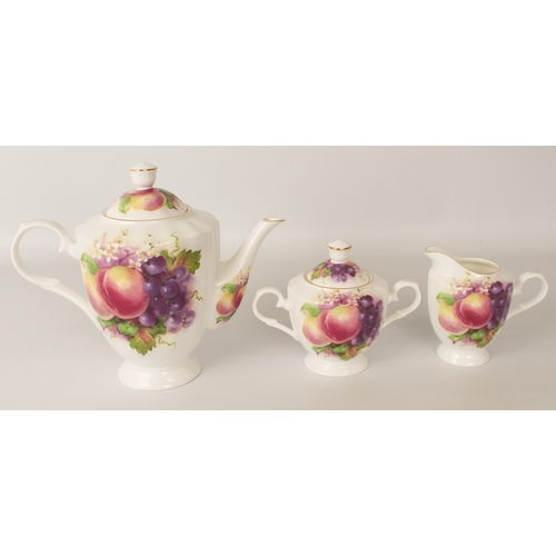 46 - A Kirsty Jane China bone china tea service - comprising six tea cups and saucers, teapot, milk jug a... 