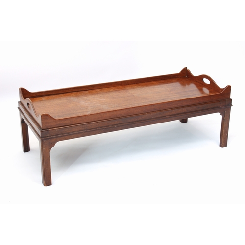 375 - A Georgian style mahogany tray-top coffee table - second half 20th century, rectangular with pierced... 