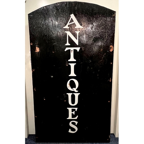 699 - A vintage painted wooden 'Antiques' shop sign - black with vertical 'old style' white lettering, arc... 