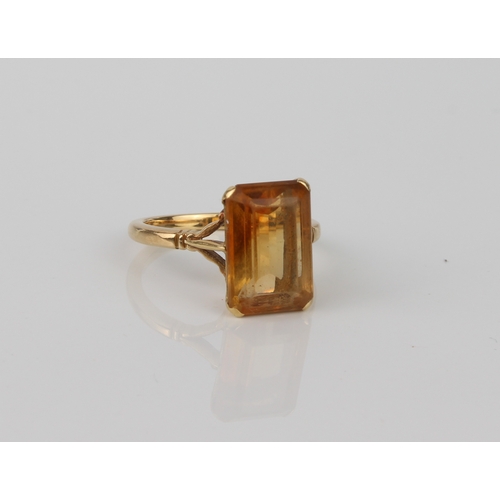 An 18ct yellow gold and yellow stone ring - unmarked, tests as 18ct ...