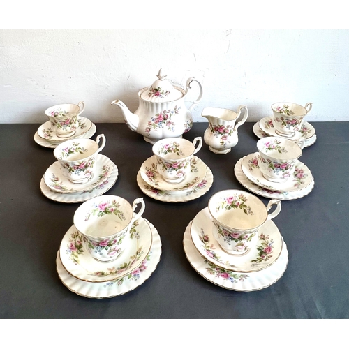 10 - A Royal Albert bone china Moss Rose pattern tea service - comprising a teapot (tiny chip to spout); ... 