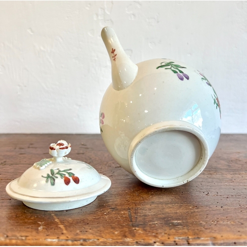 11 - A Worcester porcelain first period teapot - c.1770, globular form with C-scroll handle and moulded f... 