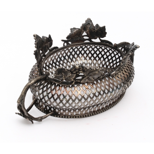 132 - A 19th century silver plated covered bon-bon dish - of bombe oval form, the lattice body with vine h... 