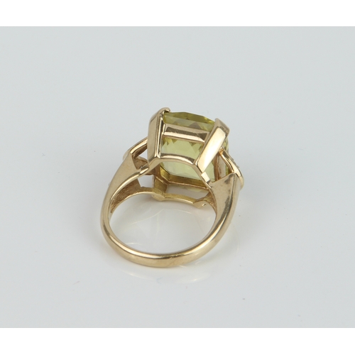 167 - A 9ct yellow gold, lemon citrine and diamond ring - hallmarked Birmingham 2006, the large, rectangul... 