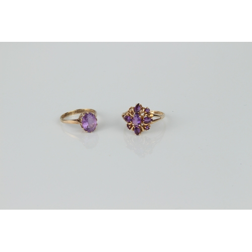 175 - Two 9ct yellow gold and amethyst rings - one with an oval cut single stone, size J; the other with a... 