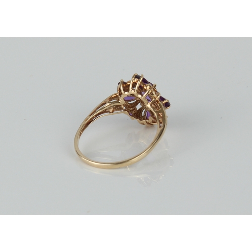 175 - Two 9ct yellow gold and amethyst rings - one with an oval cut single stone, size J; the other with a... 