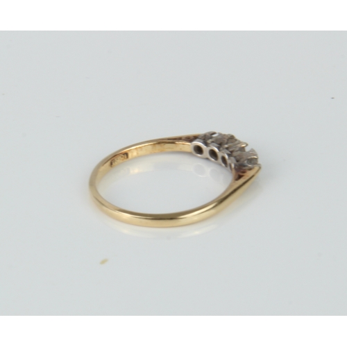 189 - An 18ct gold and diamond ring - three stones missing.