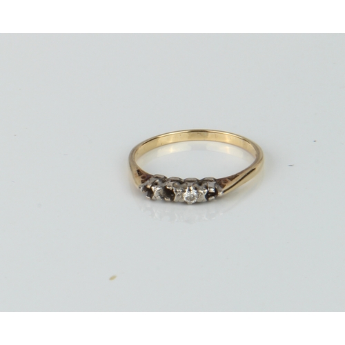 189 - An 18ct gold and diamond ring - three stones missing.