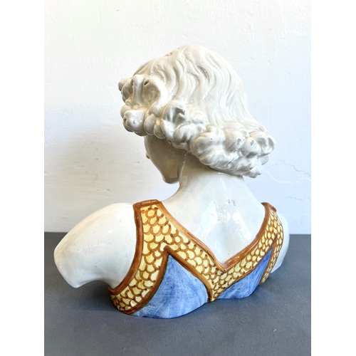 3 - An Italian majolica glazed stoneware bust of David - after the sculpture by Verrochio, tin glazed in... 