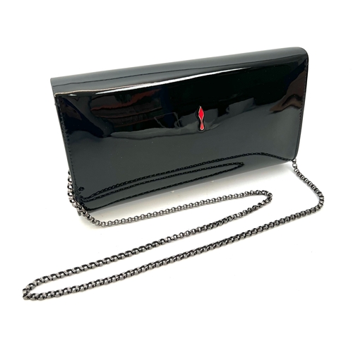 729 - Stunning Christian Louboutin Vero Dodat, black patent leather clutch bag.  

Gun metal shoulder chai... 