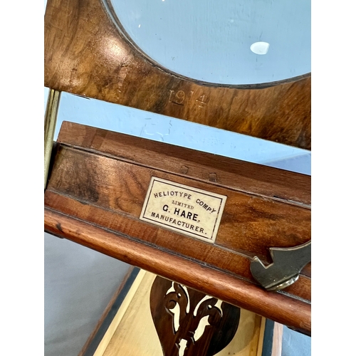 748 - A Victorian figured walnut tabletop Heliotype stereo viewer - with inset maker's plaque for the 'Hel... 