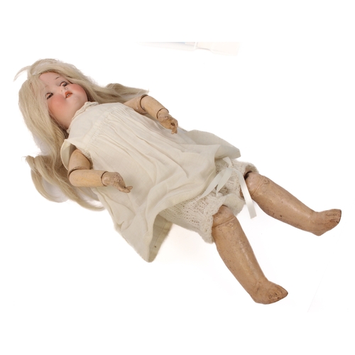 771 - A Heubach Koppelsdorf 250 bisque head girl doll - circa 1910, with weighted brown glass eyes, real u... 