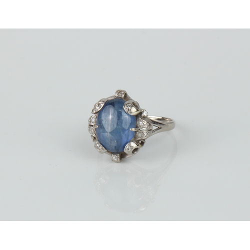 195 - A mid-century 14ct white gold, cabochon cornflower blue sapphire and diamond cluster ring - stamped ... 