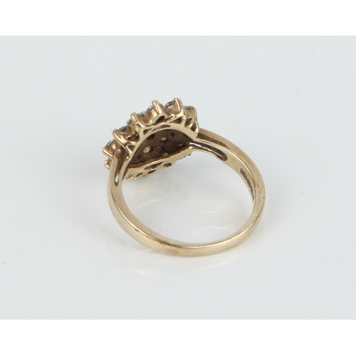 202 - A 9ct gold and CZ cluster ring - Sheffield hallmarked, size N.