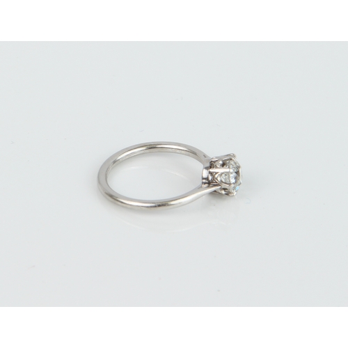 227 - A platinum and diamond solitaire engagement ring - unmarked, tests as platinum, set with an old bril... 