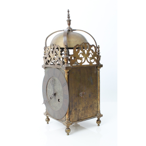 250 - A 17th century style brass lantern clock - early 20th century, the four posted frame case with pierc... 