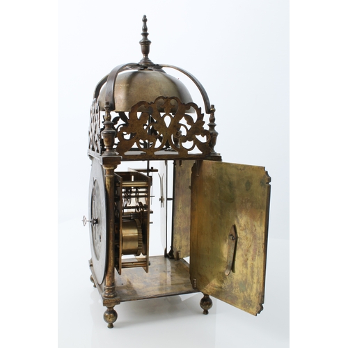 250 - A 17th century style brass lantern clock - early 20th century, the four posted frame case with pierc... 