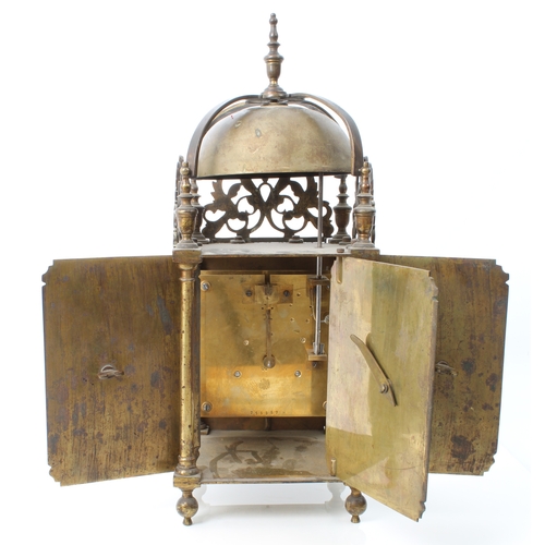 250 - A 17th century style brass lantern clock - early 20th century, the four posted frame case with pierc... 