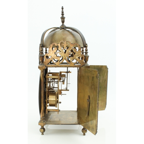 250 - A 17th century style brass lantern clock - early 20th century, the four posted frame case with pierc... 