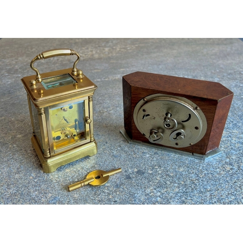 257 - A German Art Deco burr walnut and chrome alarm clock - 1940s-50s, the rectangular walnut case with b... 