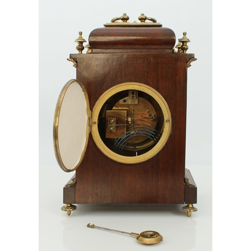 284 - An Edwardian mahogany and brass mantel clock retailed by Hopkins & Hopkins of Dublin - the signed 4½... 