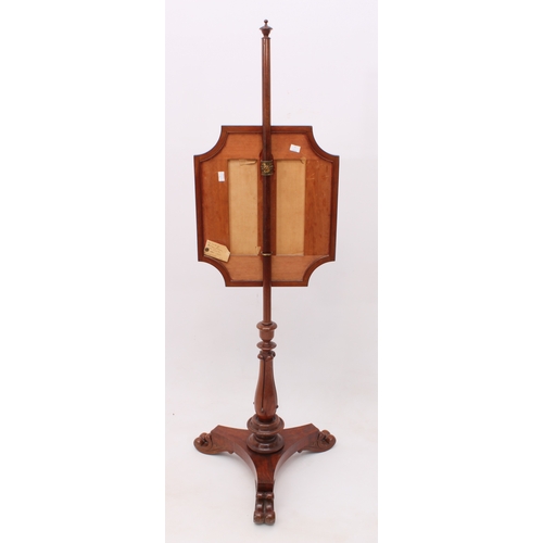 430 - A William IV walnut pole screen - the rectangular screen with incuse corners, holding a 19th century... 